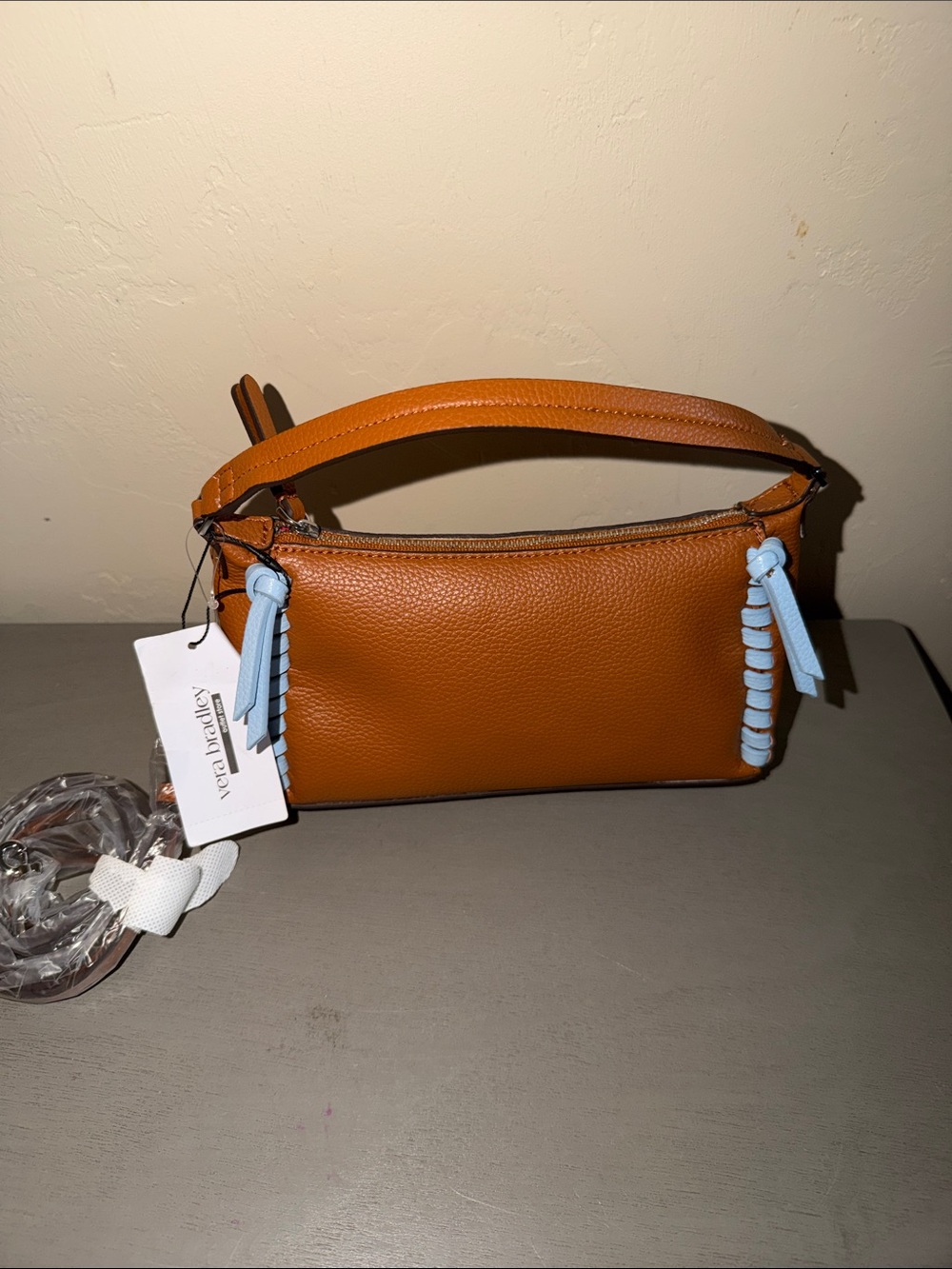 Vera Bradley Tan Shoulder Bag with Light Blue Tassel Accents